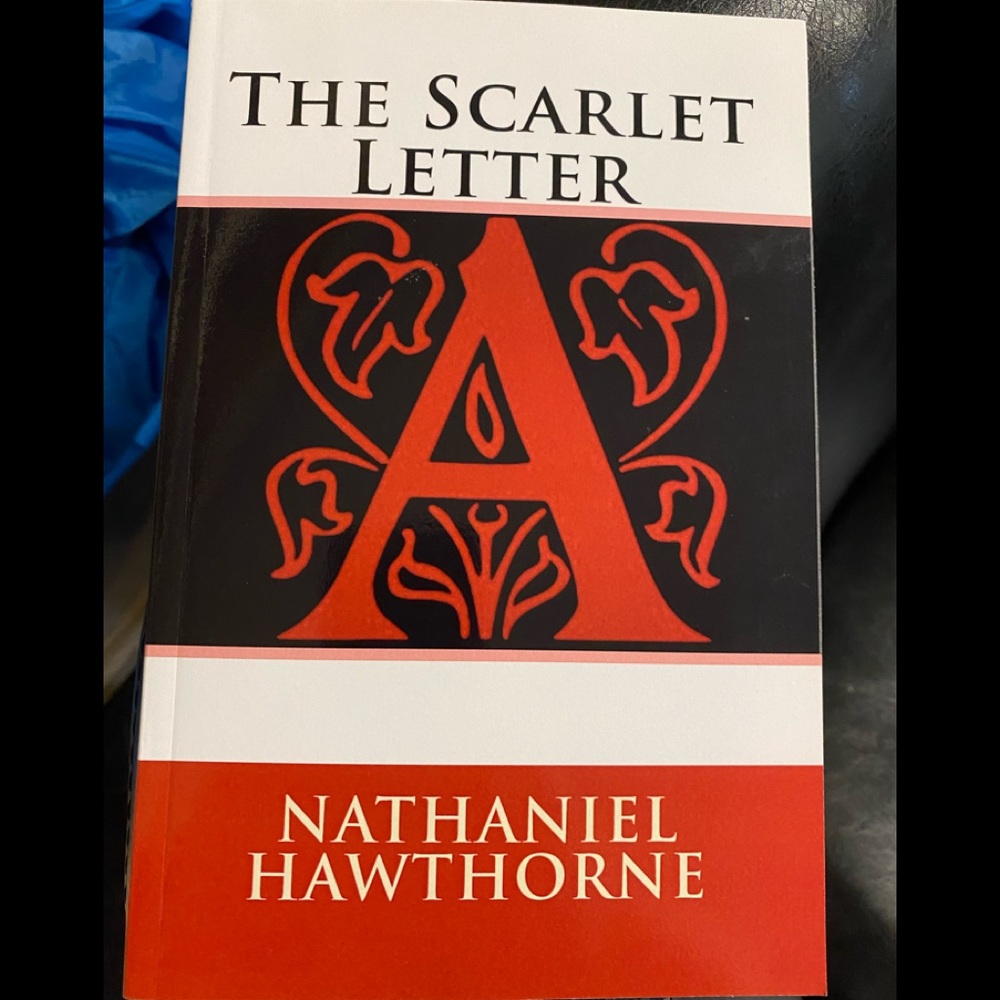 Book- The Scarlet Letter by Nathaniel Hawthorne.